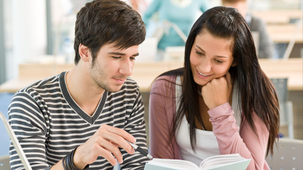 Male-and-female-student-read-book-via-Shutterstock